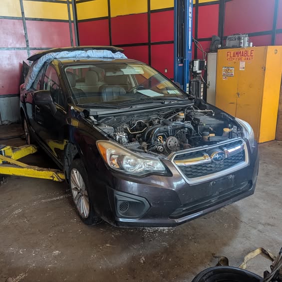 Subaru Impreza in the R&R Auto Repair bay mid engine swap